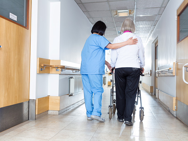 Nurse with elderly patient