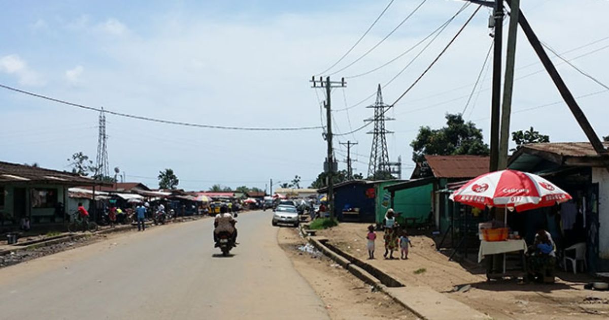 A street in Liberia with electric lines overhead